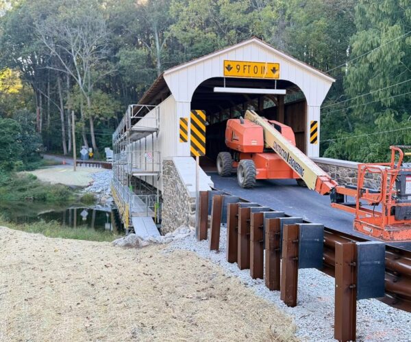 Camp Bonsall Covered Bridge with a fresh spread of LVS Enriched Topsoil.