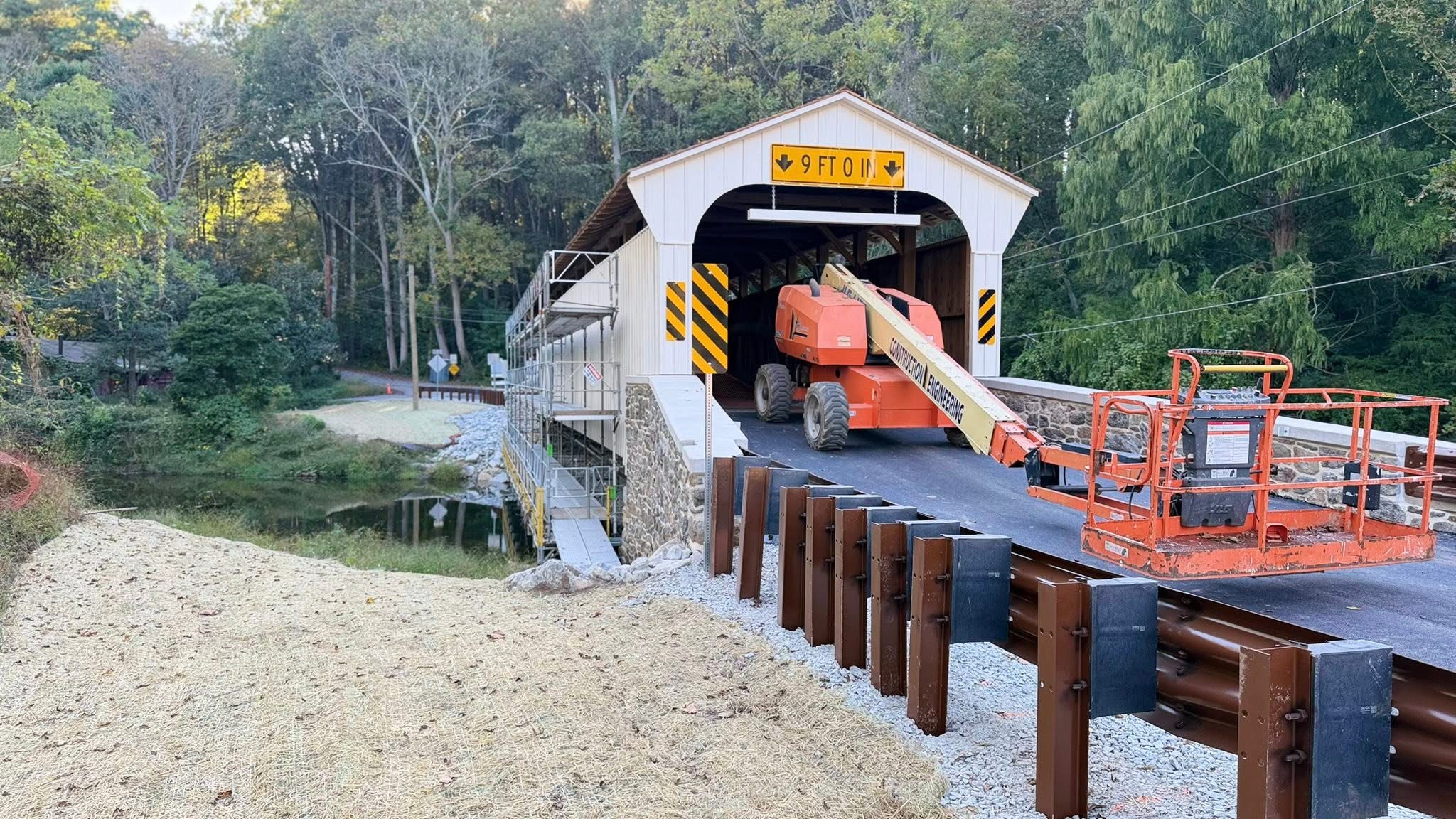 Camp Bonsall Covered Bridge with a fresh spread of LVS Enriched Topsoil.