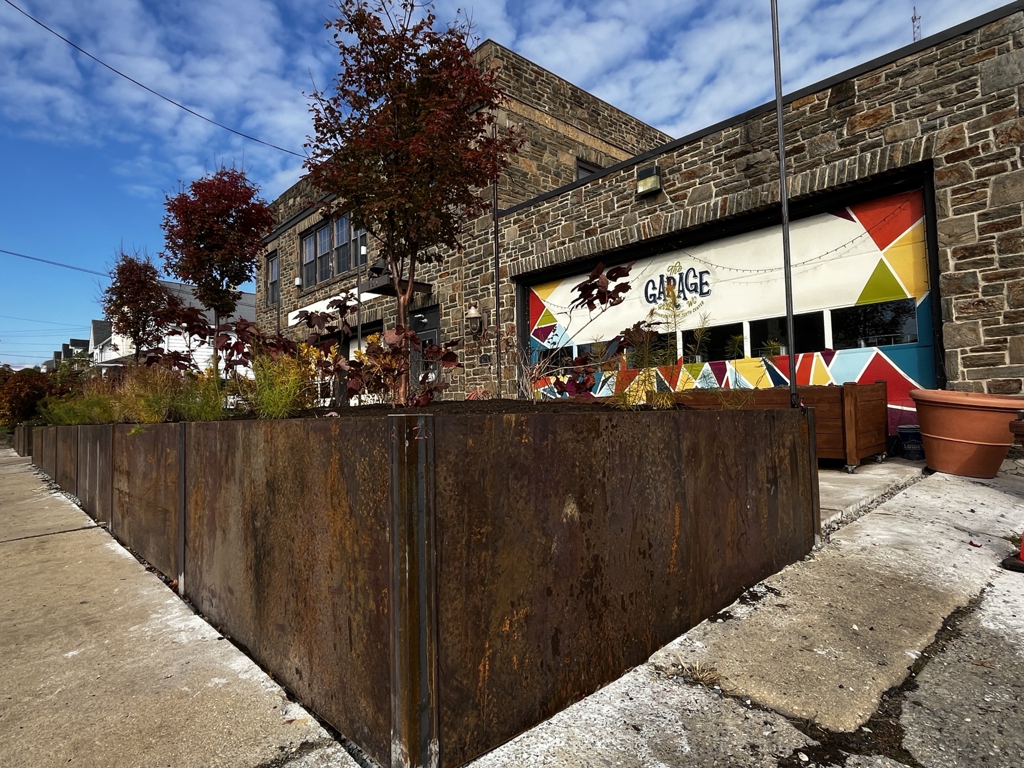 The Garage Youth Center with its new raised garden bed at the front of the building.